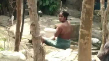 Indian busty aunty taking bath outdoor full nude, caught hidden cam