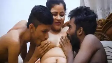 Two perverts crush a big boob milf in a desi threesome